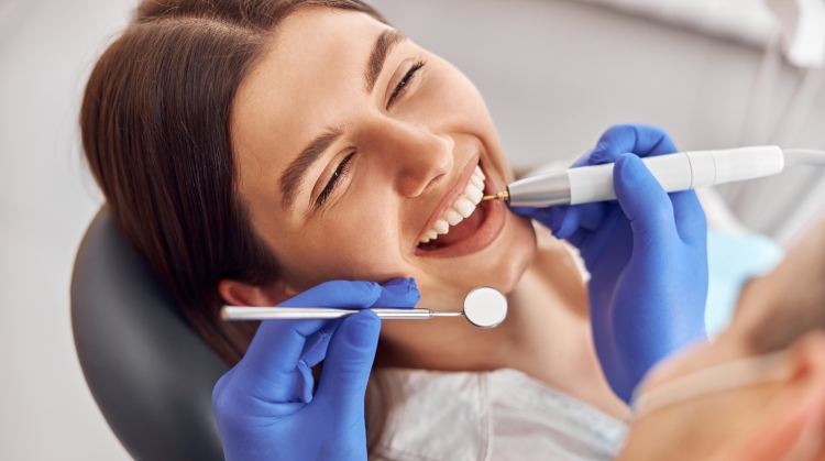 Patient receiving dental care tips at On Q Dentistry, Portland OR.